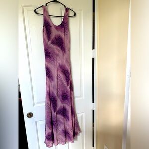 2 looks in one full length dress. Pinks and purple animal and feather prints